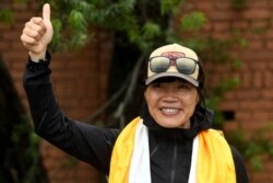 Pendaki gunung Kong Tsang Yin-hung, yang mencatat pendakian Gunung Everest tercepat di dunia (8.848,86 meter) oleh seorang wanita dalam 25 jam 50 menit, Kathmandu pada 30 Mei 2021. (Foto: AFP)