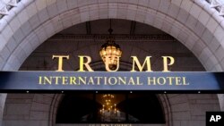 FILE - The entrance of the Trump International Hotel is seen in Washington, March 11, 2019.