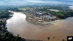 An aerial view shows damage caused by floods following Typhoon Washi in Iligan City, in the southern island of Mindanao, Philippines, December 19, 2011.