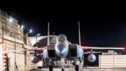 Jet tempur F-15 Eagle milik Angkatan Udara Israel terparkir di pangkalan udara dalam foto yang dirilis oleh pasukan Israel pada 14 April 2024. (Foto: srael Defense Forces/Handout via Reuters)