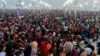 Devotees gather to take a dip at the confluence of the Ganges and Yamuna rivers during the Maha Kumbh Mela, or the Great Pitcher Festival, in Prayagraj, India, on Feb. 12, 2025.