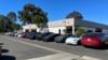 FILE - Several Tesla electric vehicles are parked in front of a Tesla service center in San Diego, Calif., Oct. 31, 2023.