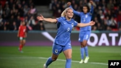 France's forward #09 Eugenie Le Sommer celebrates scoring her team's fourth goal during the Australia and New Zealand 2023 Women's World Cup round of 16 football match between France and Morocco at Hindmarsh Stadium in Adelaide on August 8, 2023.