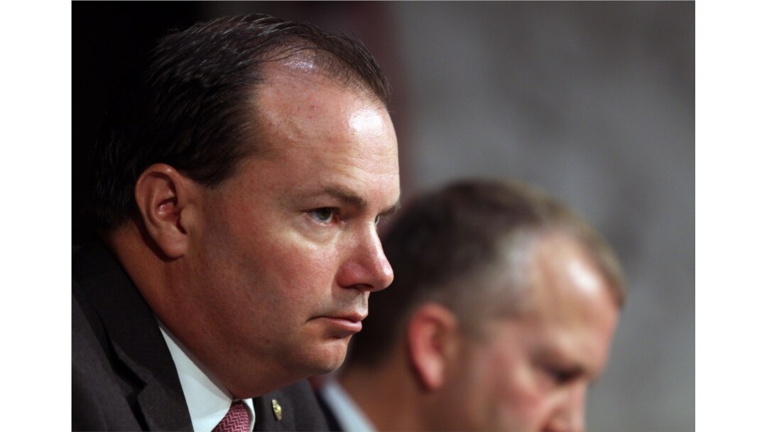 FILE - Sen. Mike Lee, R-Utah, listens during a Senate Armed Services Committee on Capitol Hill in Washington, July 21, 2015.