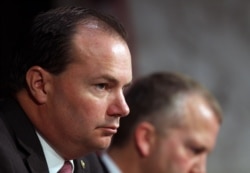 FILE - Sen. Mike Lee, R-Utah, listens during a Senate Armed Services Committee on Capitol Hill in Washington, July 21, 2015.