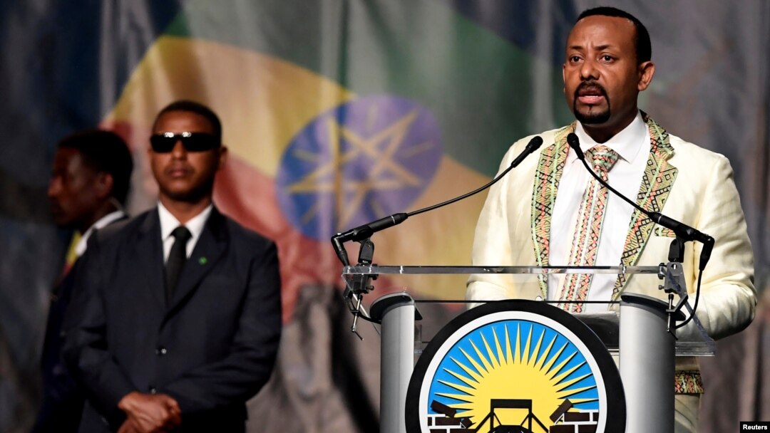 FILE - Ethiopia's Prime Minister Abiy Ahmed addresses his country's diaspora, the largest outside Ethiopia, calling on them to return, invest and support their native land. He spoke in Washington, July 28, 2018.