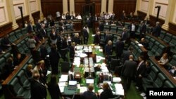 Members of parliament from the Australian state of Victoria participate in a marathon sitting to discuss a euthanasia bill in Melbourne, Australia, Oct. 20, 2017.