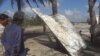 Metal Debris Found on Thai Beach Likely Japan Rocket, Not MH370