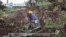 VOA60 Africa - Fifteen dead, more than 100 missing in Uganda landslide