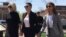 Actress Rose McGowan, flanked by lawyers Jennifer Robinson, left, and Jessica Carmichael, right, outside the Loudoun County courthouse in Leesburg, Virginia, May 3, 2018.