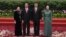 FILE - Vietnam's President Tran Dai Quang, second left, and his wife Nguyen Thi Hien, left, pose with Chinese President Xi Jinping and his wife Peng Liyuan during a welcome ceremony for leaders attending the Belt and Road Forum, at the Great Hall of the People in Beijing, May 14, 2017.