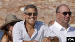 George Clooney dijo que "vamos a trabajar con la comunidad internacional para hacer más severas las sanciones".