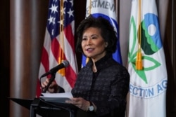 FILE - U.S. Department of Transportation Secretary Elaine Chao speaks during a press conference on the One National Program Rule on federal preemption of state fuel economy standards at EPA headquarters in Washington, Sept. 19, 2019.