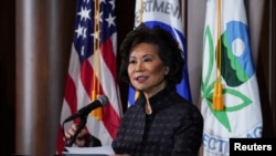 FILE - U.S. Department of Transportation Secretary Elaine Chao speaks during a press conference on the One National Program Rule on federal preemption of state fuel economy standards at EPA headquarters in Washington, Sept. 19, 2019. 