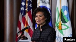 FILE - U.S. Department of Transportation Secretary Elaine Chao speaks during a press conference on the One National Program Rule on federal preemption of state fuel economy standards at EPA headquarters in Washington, Sept. 19, 2019. 