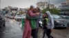 Mohammed Sleem hugs his daughter Menisa Sleem, as he meets her after two months, according to Mohammed, after a cease-fire between Israel and Iran-backed group Hezbollah took effect, in Tyre, Lebanon, Nov. 27, 2024. 