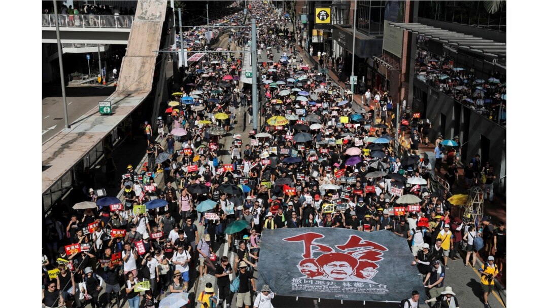 Anti-extradition bill protesters march during the anniversary of Hong Kong's handover to China in Hong Kong. (Reuters)