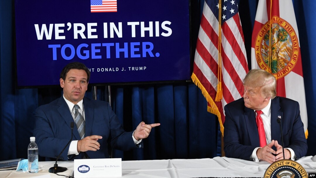 Arhivska fotografija, Ron DeSantis (lijevo) i Donald Trump