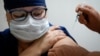 Nhân viên nhà nước Nga chịu áp lực tham gia tiêm thử vắc xin Covid-19