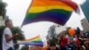 FILE - Participants attend the 5th annual LGBT pride parade in Hanoi, Vietnam, Aug. 21, 2016. East Timor, Asia's youngest nation, held its second LGBT pride parade July 20.