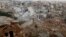Hình tư liệu - Thị trấn Darat Izza của Aleppo sau các cuộc không kích của lực lượng không quân Nga.