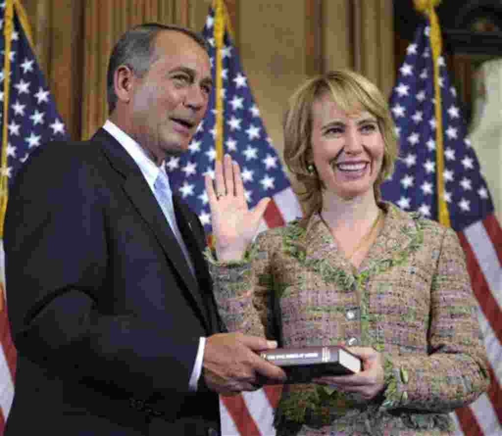 House Speaker John Boehner reenacts the swearing in of Representative Gabrielle Giffords, a Democrat from Arizona., on Capitol Hill in Washington, 5 Jan 2011 (file photo)