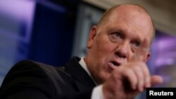 FILE - Thomas Homan, acting director of U.S. Immigration and Customs Enforcement, speaks at the White House in Washington, July 27, 2017. Homan said Feb. 15, 2018, that he was "appalled" by the actions of former ICE official Raphael Sanchez, who has pleaded guilty of identity theft.