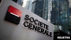 FILE: The logo of Societe Generale is seen on the headquarters at the financial and business district of La Defense near Paris, France, on Feb. 4, 2020.