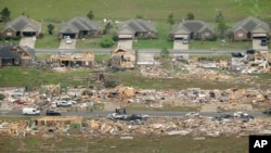 Vilonia, Ark., seen on April 28, 2014 after a tornado struck the town late Sunday, killing at least 16 people. (AP Photo/Danny Johnston)