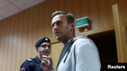 Rusiya müxalifət lideri Aleksey Navalnı Moskvada məhkəmə zalında, 27 avqust, 2018.