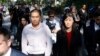 Former New York Governor Kathy Hochul aide Linda Sun, right, and her husband, Christopher Hu leave Brooklyn Federal Court after their arraignment in New York, Sept. 3, 2024.