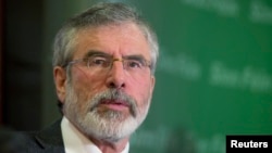 Sinn Fein's Gerry Adams holds a news conference following his release from police detention, in Belfast, May 4, 2014.