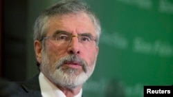 Sinn Fein's Gerry Adams holds a news conference following his release from police detention, in Belfast, May 4, 2014.