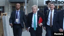 Britain's Foreign Secretary Boris Johnson arrives for a reception at the Royal Ontario Museum on the first day of meetings of foreign ministers from G-7 countries in Toronto, Canada, April 22, 2018.