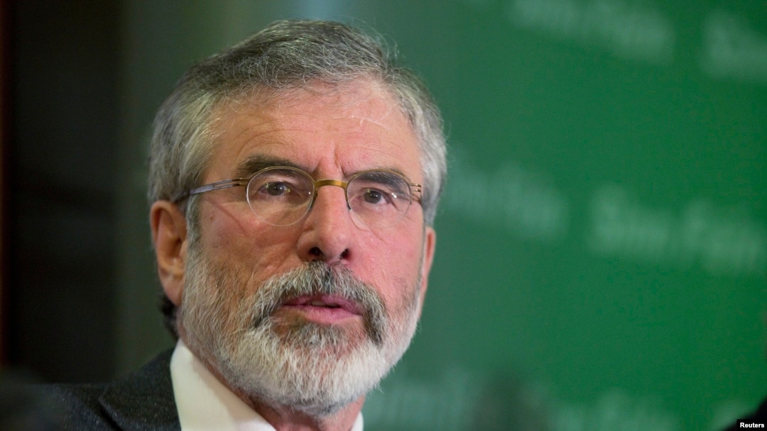 FILE - Sinn Fein's Gerry Adams holds a news conference following his release from police detention, in Belfast, May 4, 2014.