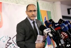 FILE—Abderrazak Makri, leader of the Movement for a Peaceful Society during a press conference at the party headquarters in Algiers, June 16, 2021