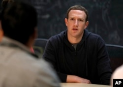 FILE - Facebook CEO Mark Zuckerberg meets with a group of entrepreneurs and innovators in St. Louis, Missouri, Nov. 9, 2017.