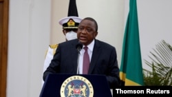 Kenya's President Uhuru Kenyatta speaks during a joint statement with Tanzanian President Samia Suluhu Hassan at the State House, in Nairobi, Kenya, May 4, 2021.