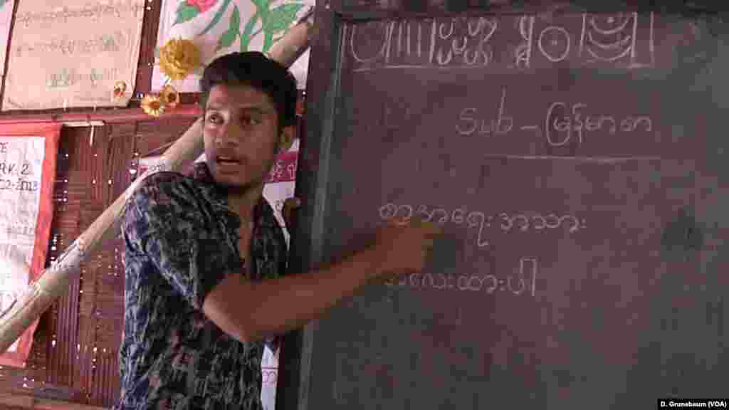 Shamsuddin, a Rohingya refugee himself, teaches Burmese language to Rohingya children. Like many of the teachers in the refugee camps he has only finished high school.