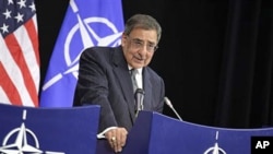 United States Secretary of Defense Leon Panetta speaks during a media conference at NATO headquarters in Brussels, April 18, 2012.