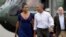 President Barack Obama and first lady Michelle Obama walk on the tarmac at Matha's Vineyard Airport in West Tisbury, Mass., Aug. 6, 2016. The president and his family are vacationing in the Massachusetts island of Martha's Vineyard. 