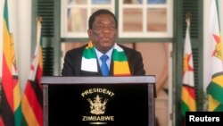 FILE — Zimbabwe's President Emmerson Mnangagwa speaks to the media at State House in Harare, on August 27, 2023. 