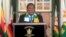 FILE — Zimbabwe's President Emmerson Mnangagwa speaks to the media at State House in Harare, on August 27, 2023. 