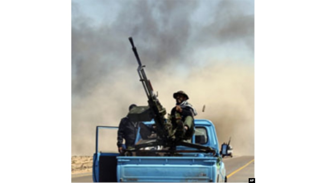 In Libya, thousands of Ghanaian migrant workers have fled fighting between rebels and loyalists to President Moammar Gadhafi.
