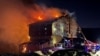 Firefighters work to extinguish a fire at a hotel in the ski resort of Kartalkaya in Bolu, Turkey, Jan. 21, 2025. Ihlas News Agency (IHA) via REUTERS 