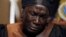 Monica Stover uwar daya daga cikin yara mata fiye da 200 da aka sace a garin Chibok ke nan a taron manema labarai akan yaran da aka yi a Legas 5 ga watan Yuni, 2014.