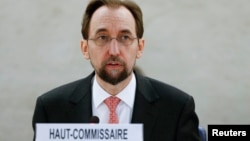 United Nations High Commissioner for Human FILE - Rights Zeid Ra'ad Al Hussein addresses delegates during a special session of the Human Rights Council on the situation in Burundi in Geneva, Switzerland, Dec. 17, 2015. 