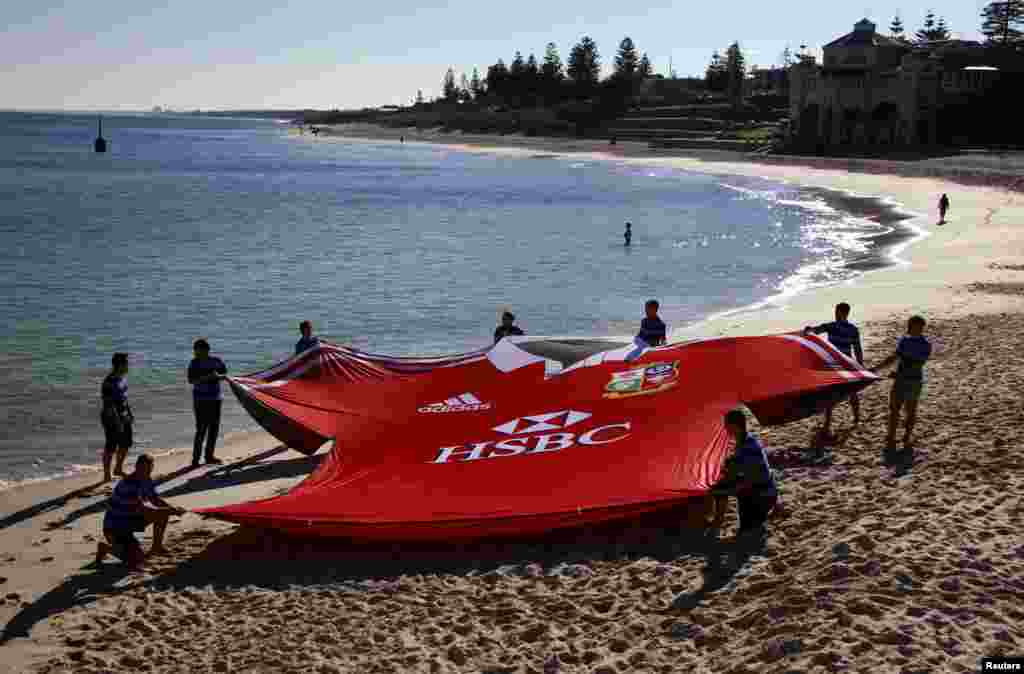 A giant British and Irish Lions team jersey is unveiled on Perth&#39;s Cottesloe Beach, Australia. 