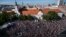 Demonstrators hold up flags of Slovakia and EU during an anti-corruption rally in Bratislava, Slovakia, June 5, 2017. 