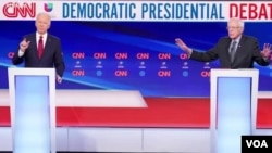 Hai ứng cử viên Joe Biden (trái) và Bernie Sanders tranh luận về phản ứng của chính phủ Mỹ trước dịch Covid-19.